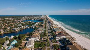 A view of a town next to the ocean